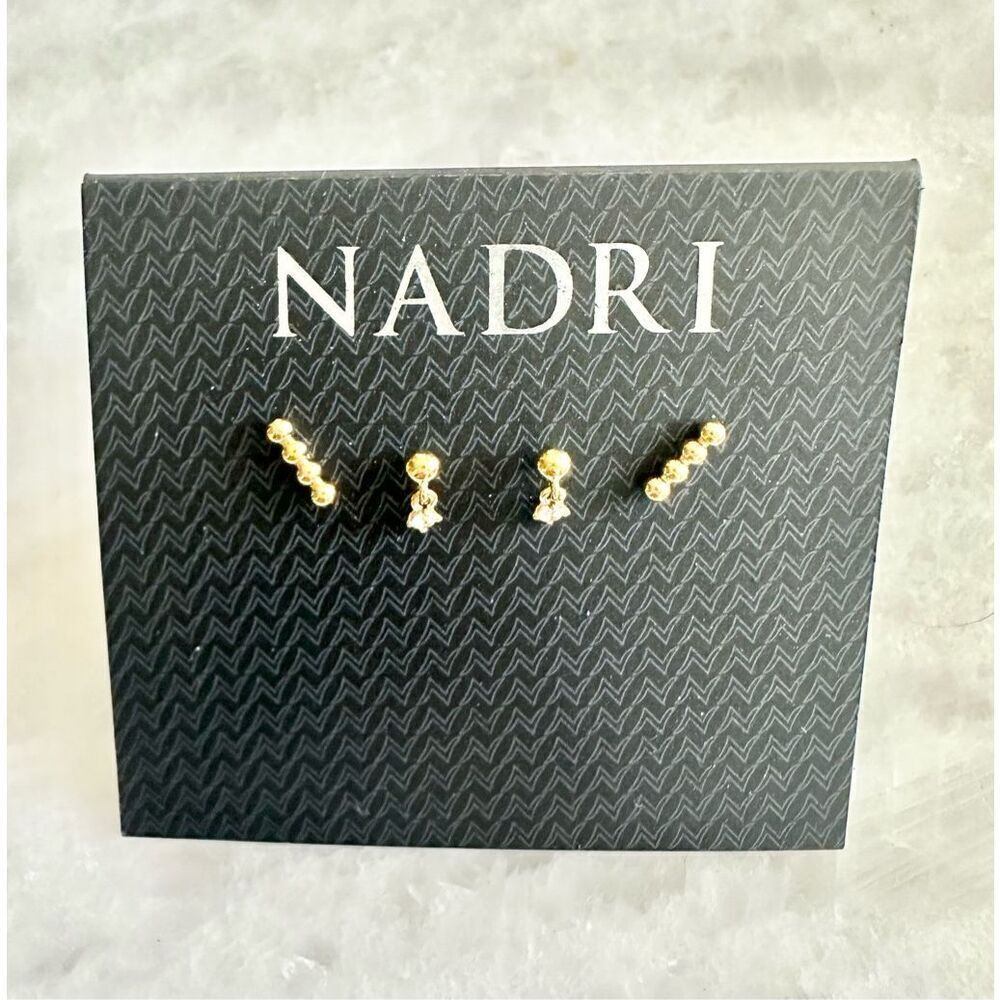 Gold set of two petite Nadri stud earrings ￼
